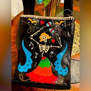RocketBuster “Day of the Dead” Handbag. Valued at $1,500. Asking $400.